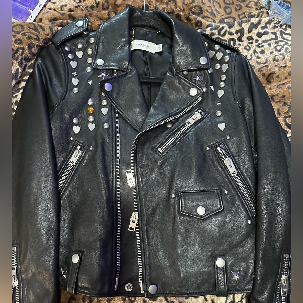 Leather jacket with hearts on it